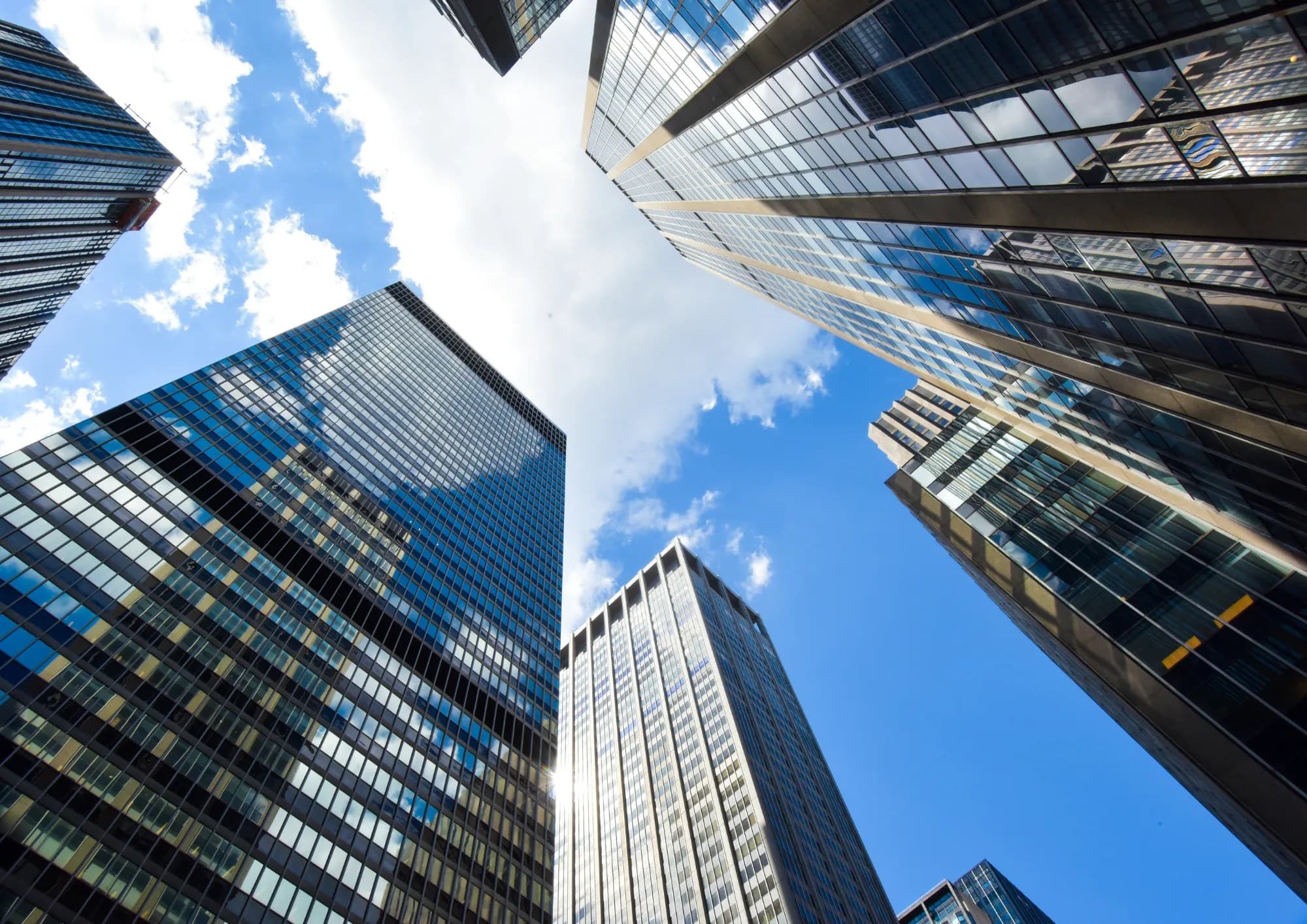 Looking up between city towers